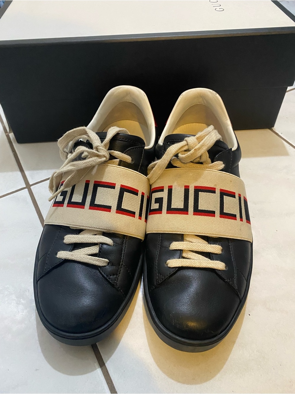 Gucci Black Leather Sneakers with Beige Logo Strap and Red Accent